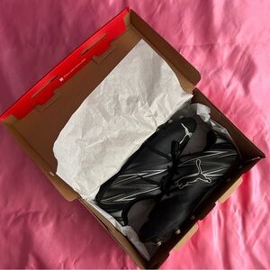 Puma Black Soccer Cleats + adidas shin guards